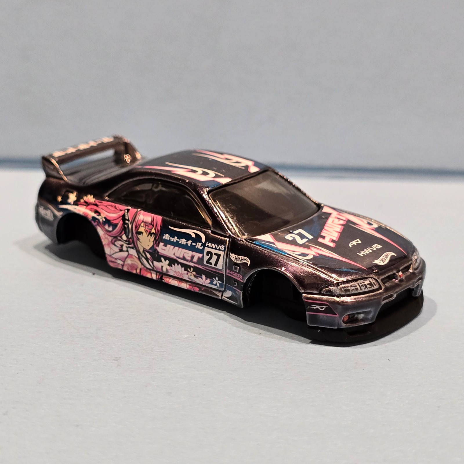 HOT WHEELS 2025 UNSPUN NFT NISSAN SKYLINE GT-R R33 - UNSPUN NO WHEELS