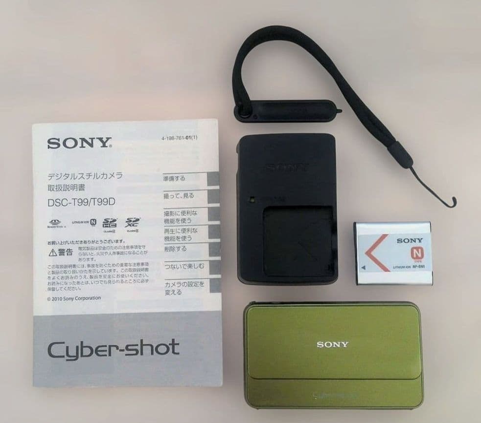 SONY Cyber-shot DSC-T99 (Green) with Mickey Mouse case