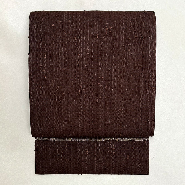 縦節紬焦茶の名古屋帯 浦野理一作 187,000円(税込)帯24-12-53ご売約済