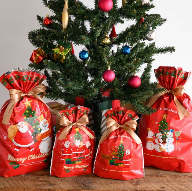 愉快なクリスマスリボン付PPギフト巾着袋-M｜ギフト、ラッピング用品