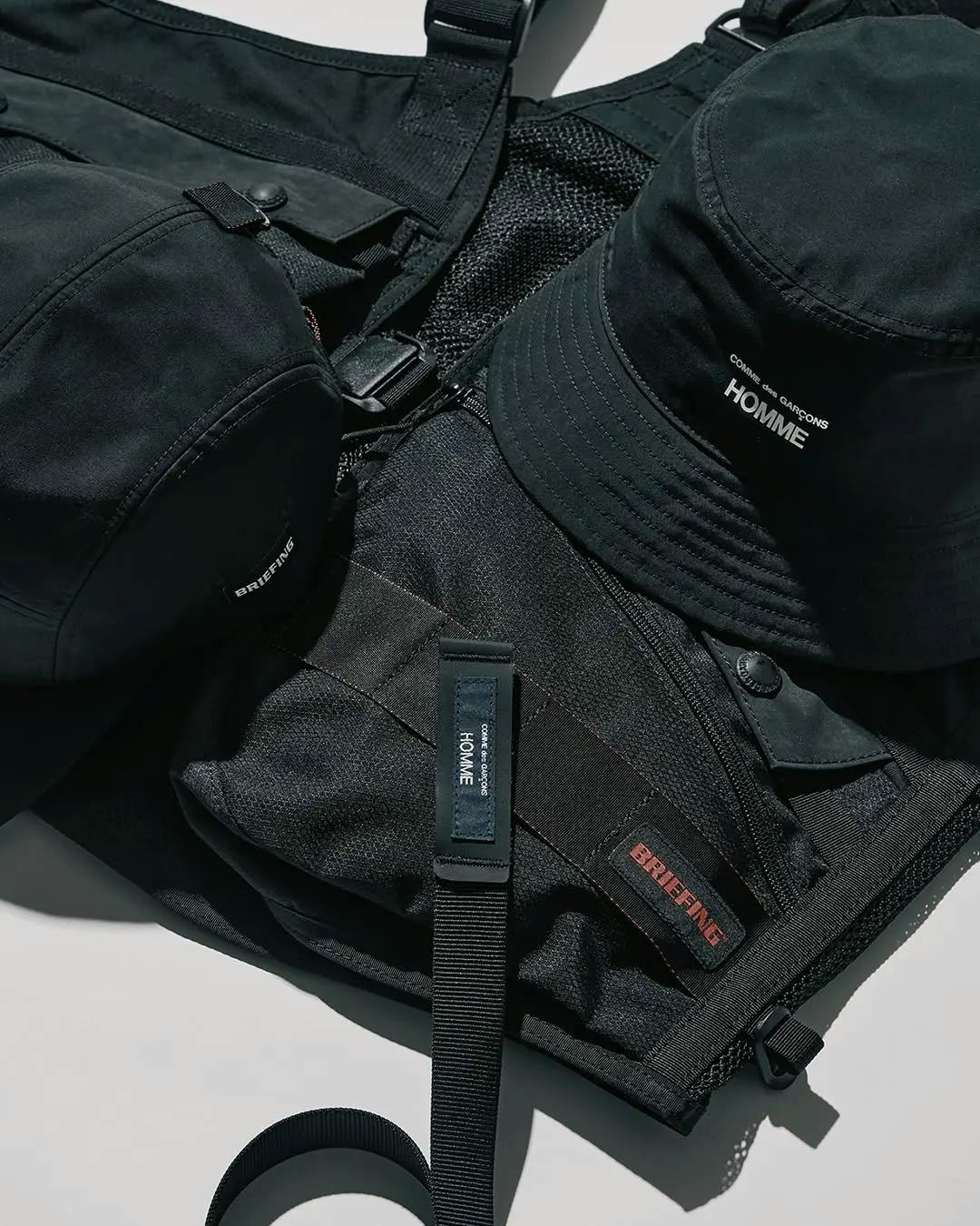 Can COMME des GARÇONS HOMME Make Briefing Cool?