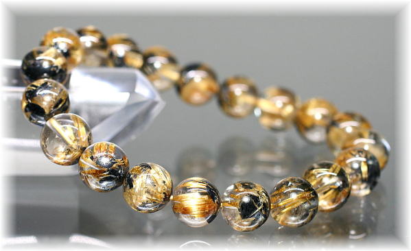 太陽放射タイチンルチルクォーツ 10mm玉 ブラジル産ルチル 金運 開運