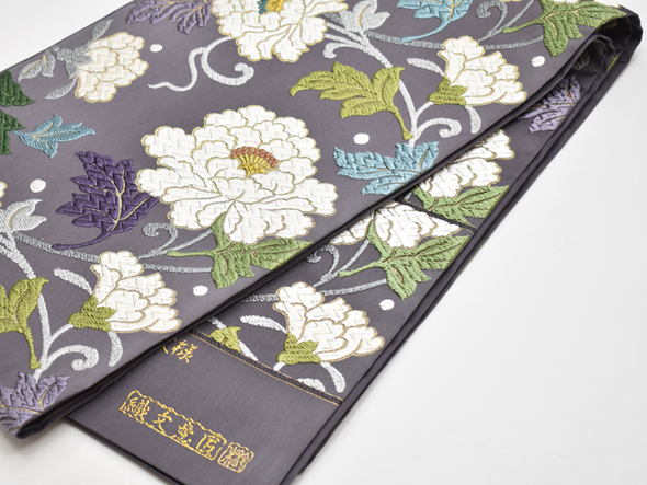 織文意匠鈴木 唐綾錦袋帯(大牡丹唐花文様・深紫) | 商品紹介 | 染と織