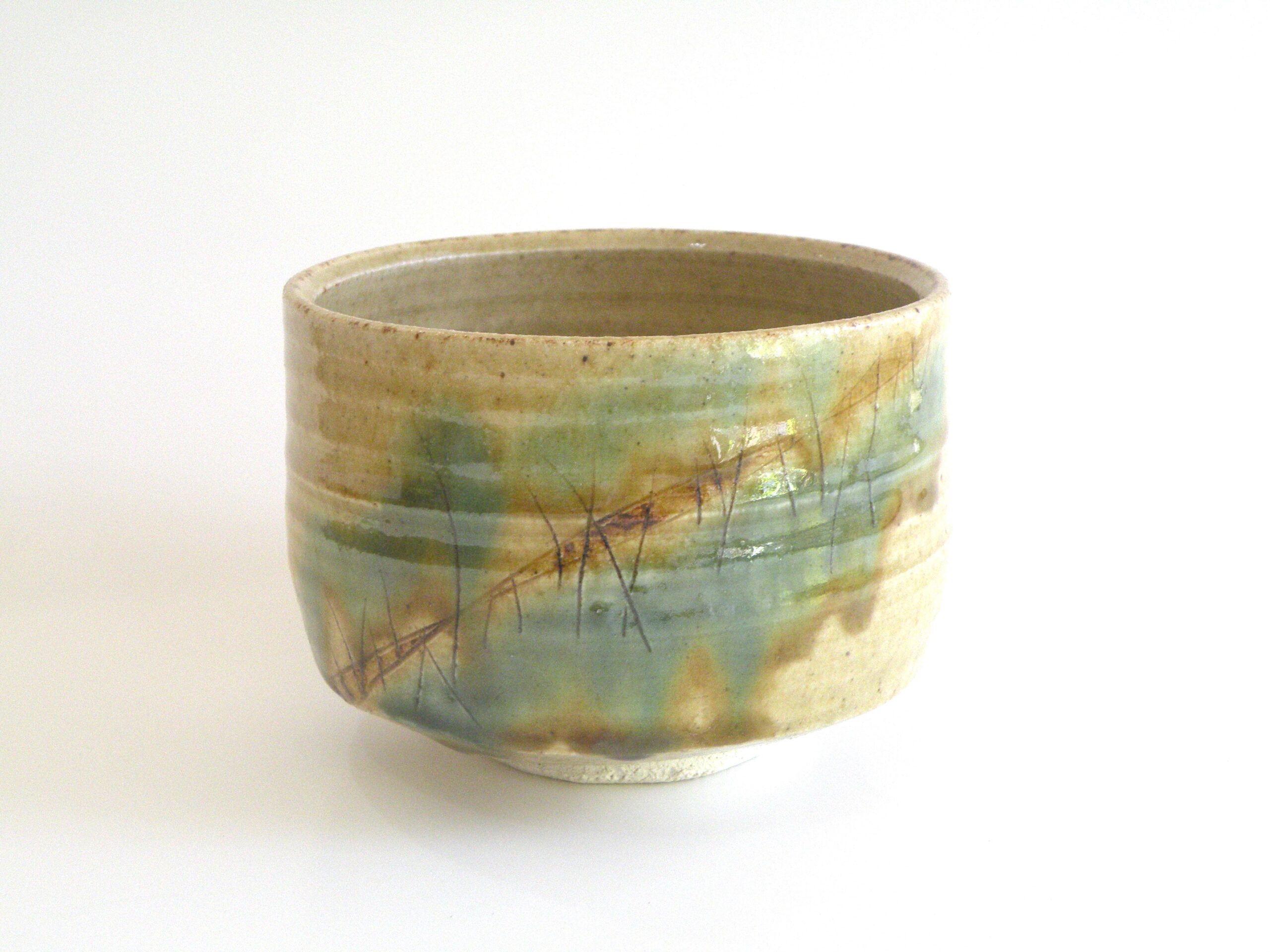 美濃焼伝統工芸品協同組合 | 黄瀬戸草原紋茶碗