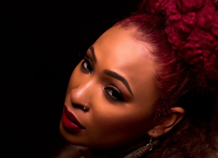 SHEEN Magazine Grammy Nominated Singer-Songwriter, MC and Activist