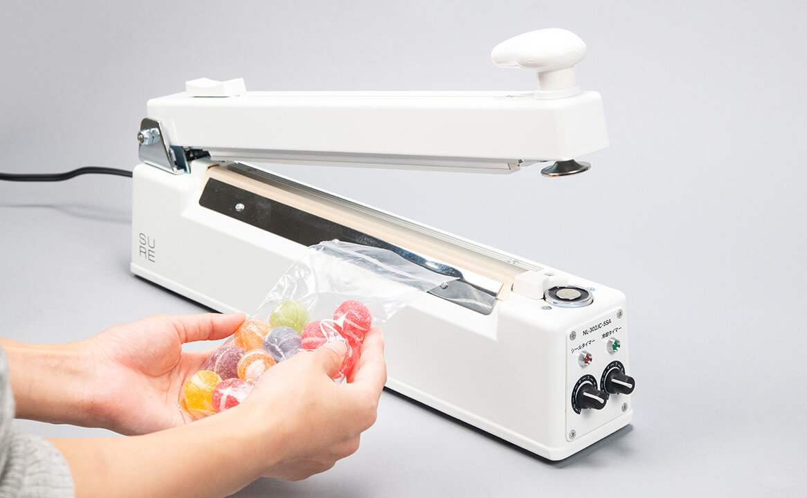 NL-302JC-5SA ワンランク上のシーラー卓上タイプ（セミオート） | 石崎