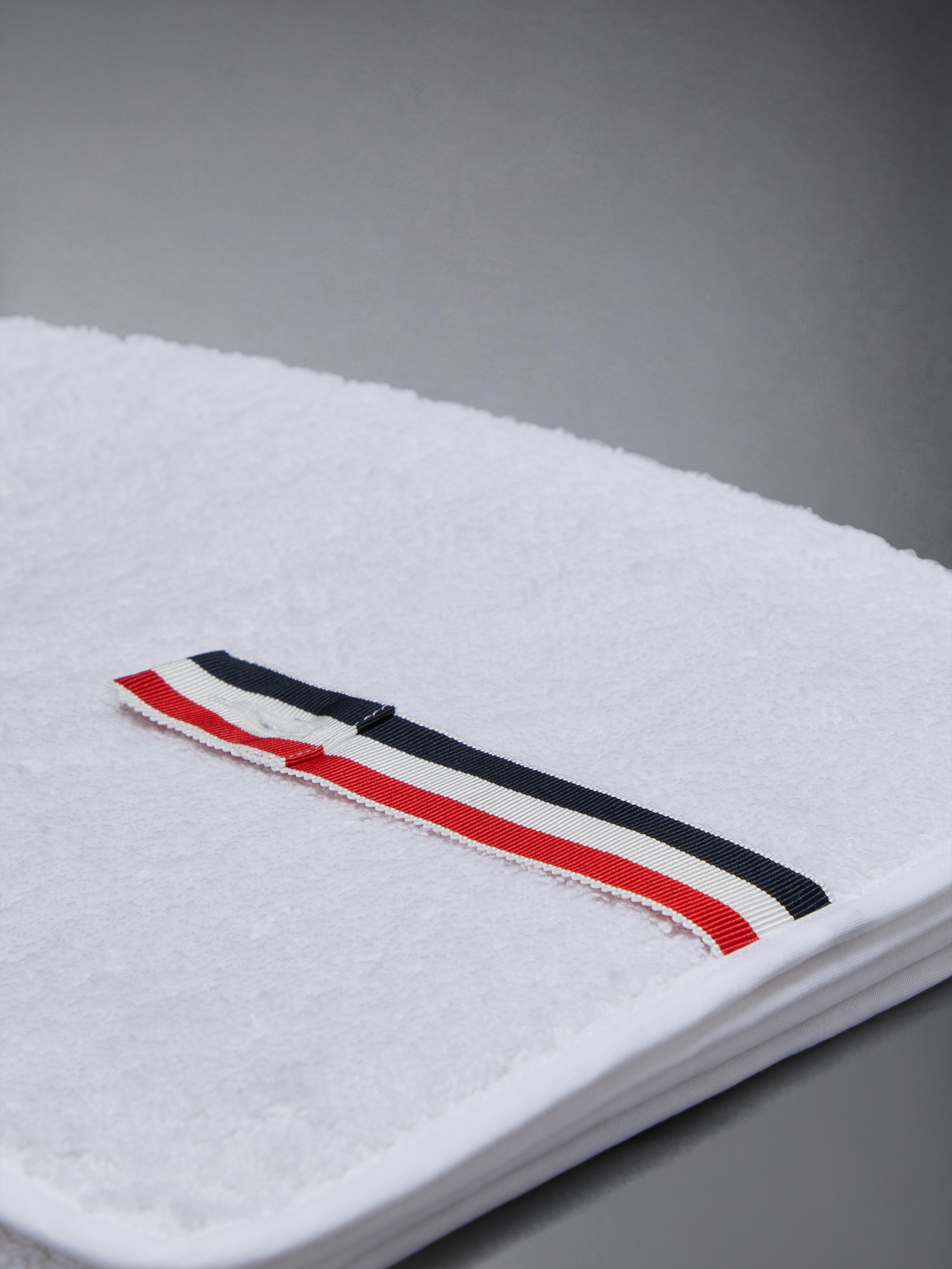 コットンテリーフレッテジムタオル | Thom Browne