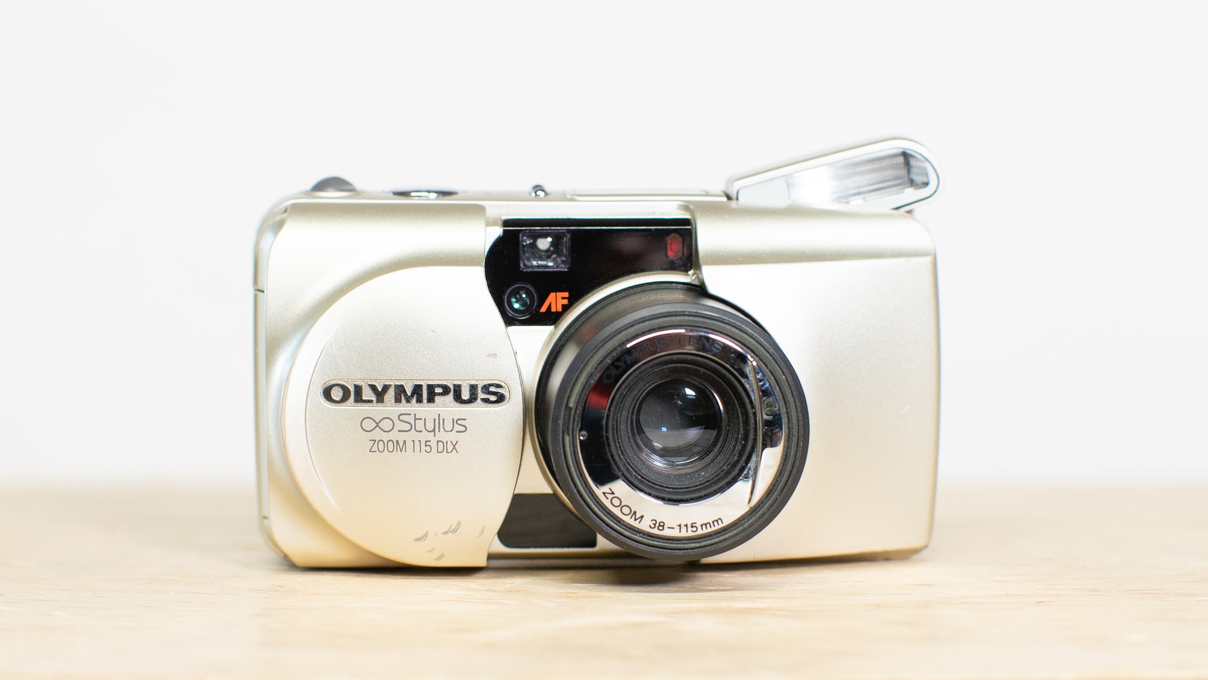 Olympus Infinity Stylus Zoom 115 Deluxe Point and Shoot 35mm Film