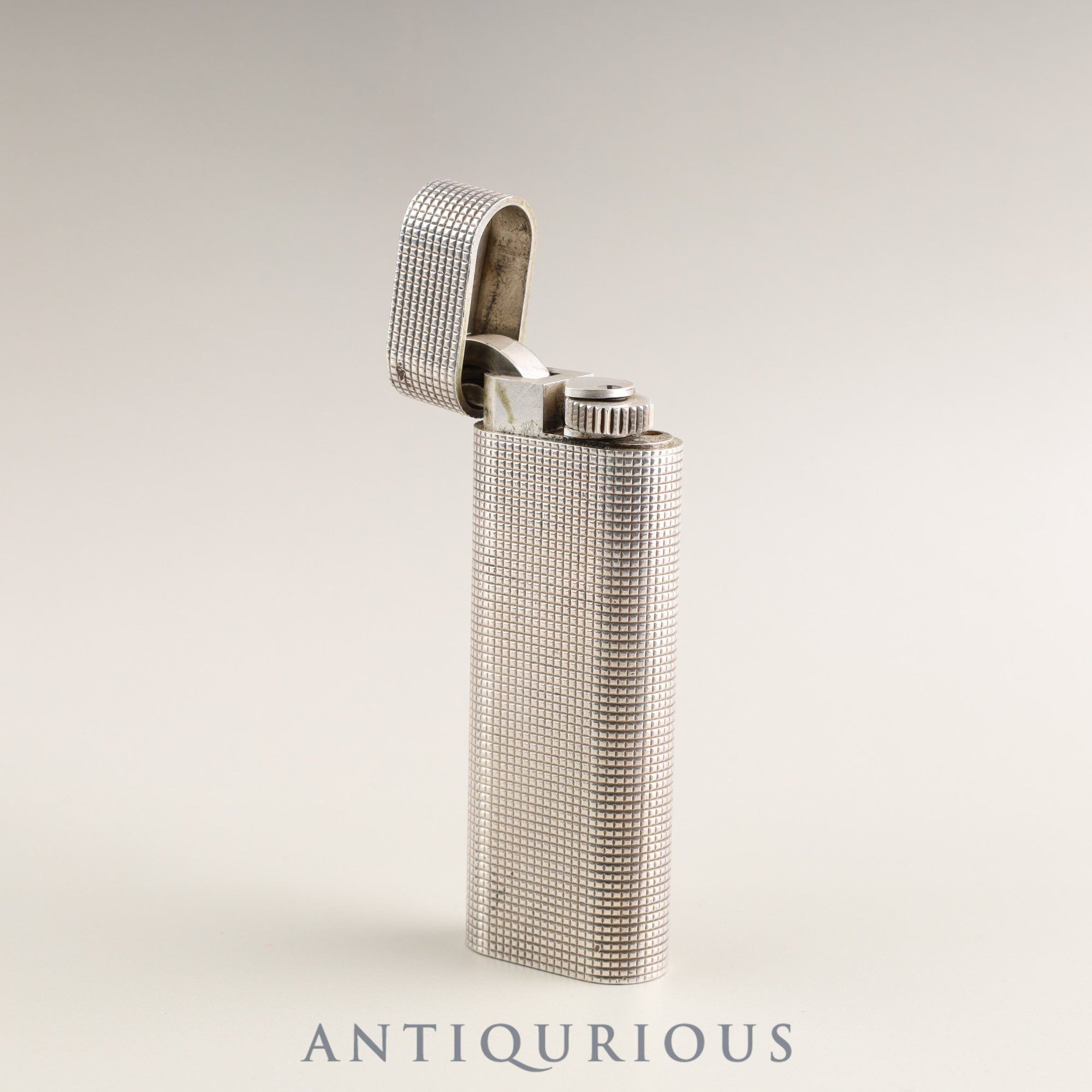 カルティエ ライター オーバル シルバーカラー格子柄 機械調整済み