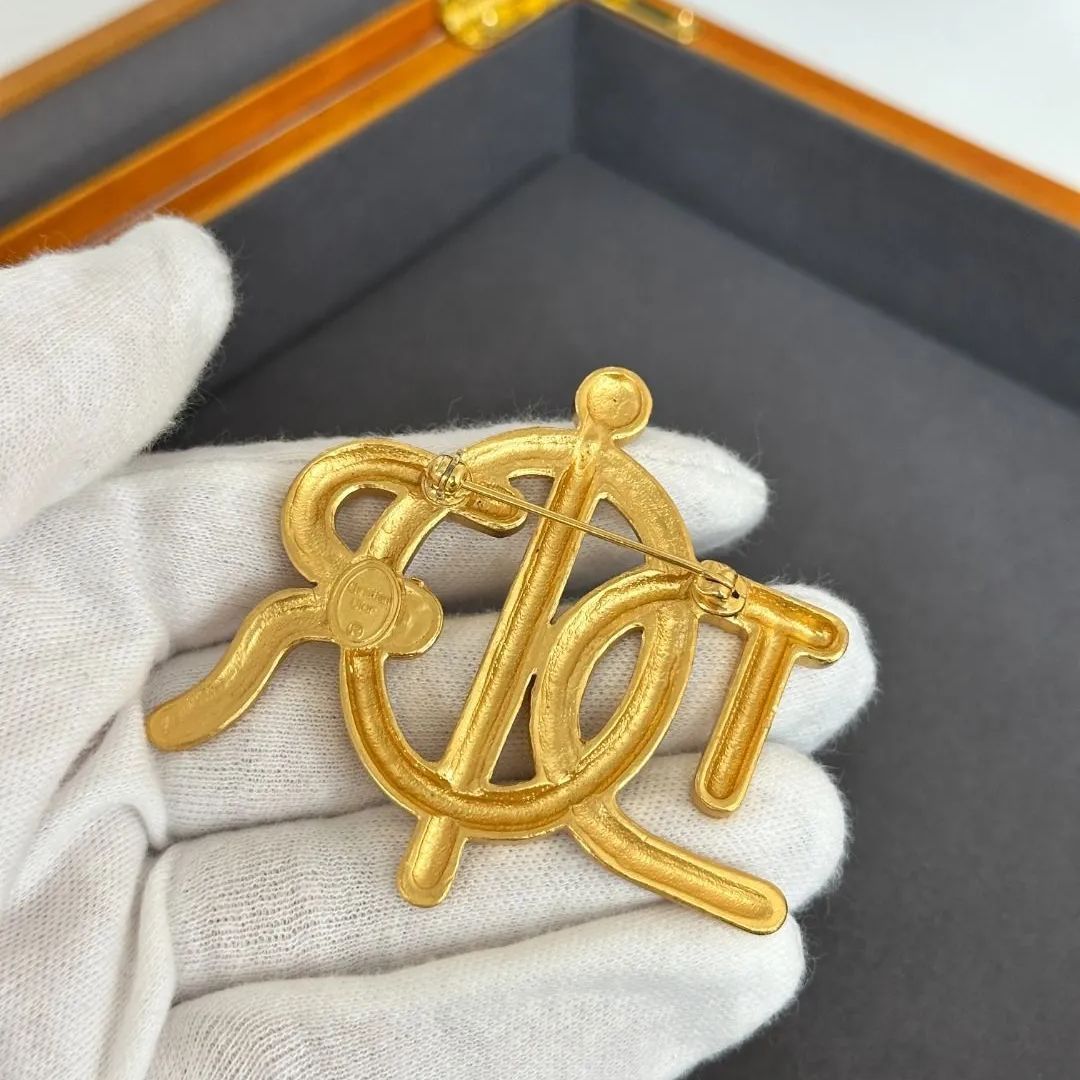 Dior ディオール クリスチャンディオール ブローチ リボン ゴールド