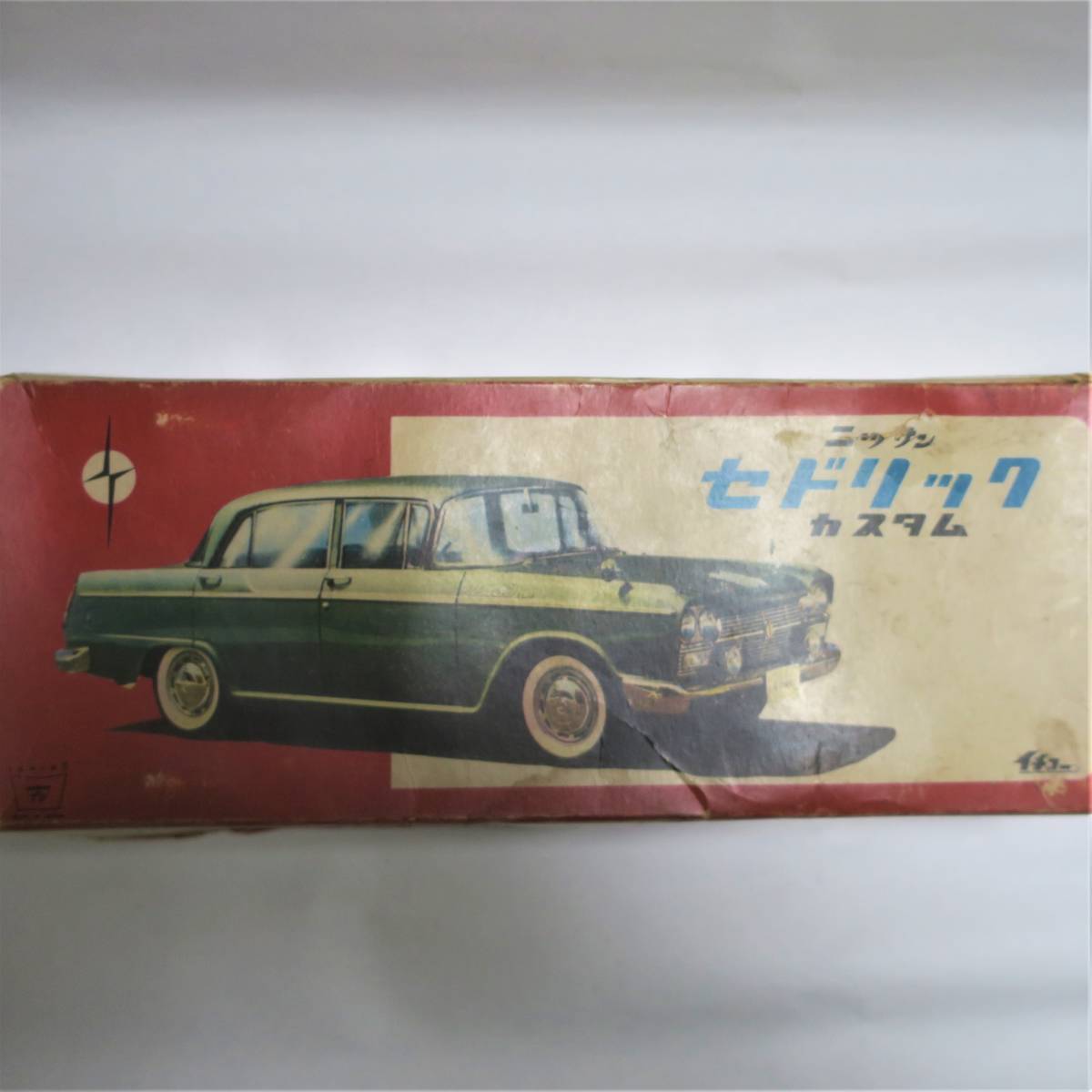 昭和レトロ イチコー ブリキ 日産セドリック・カスタム 縦目4灯 初期