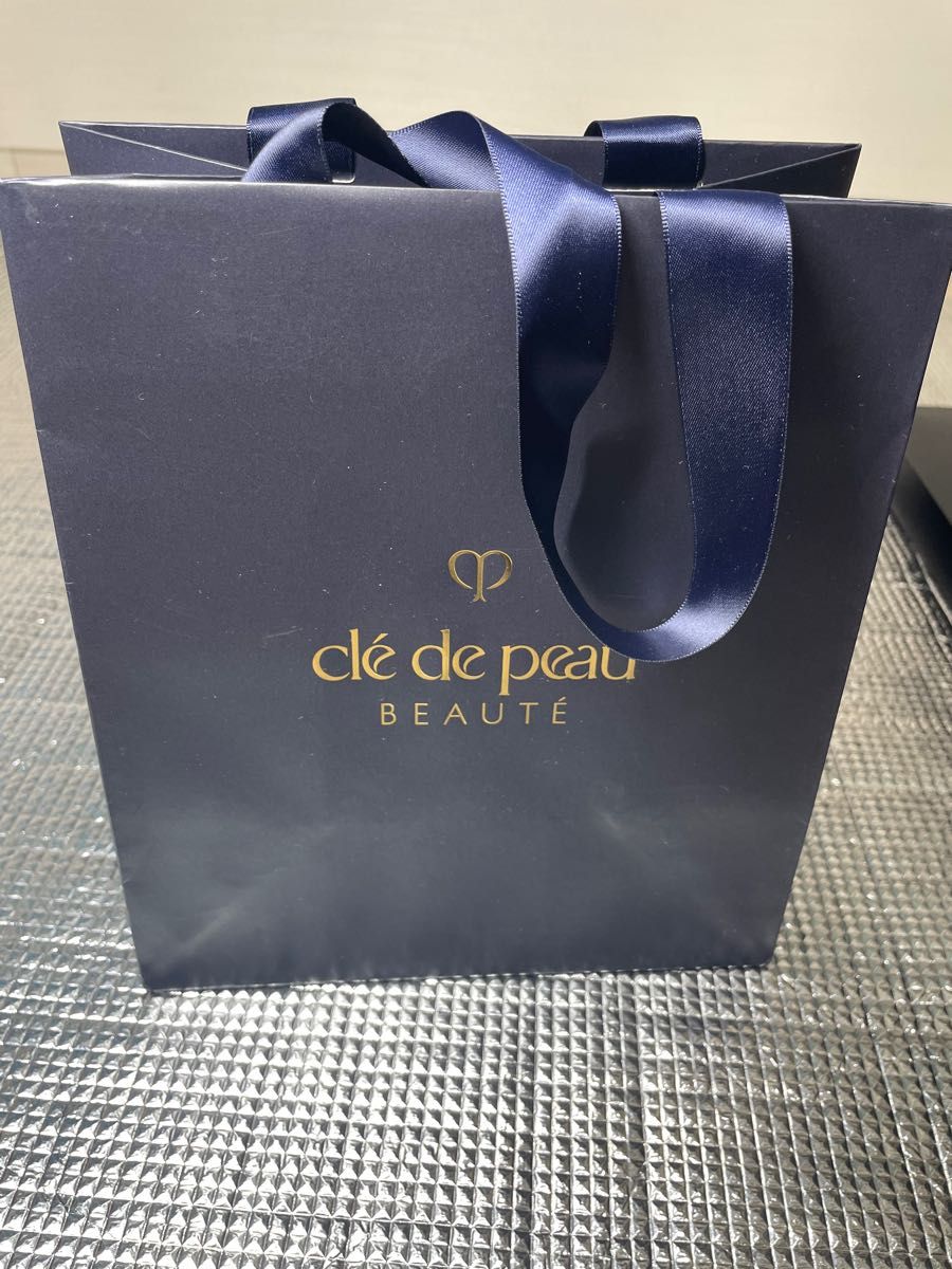 クレ・ド・ポーボーテ クレドポーボーテ シナクティフ ショップ紙袋