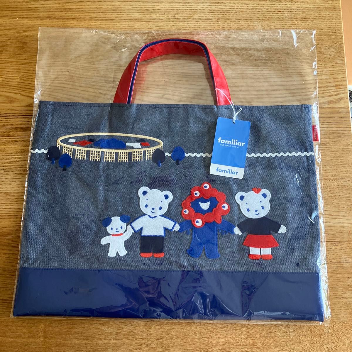 ファミリアミャクミャクコラボバック