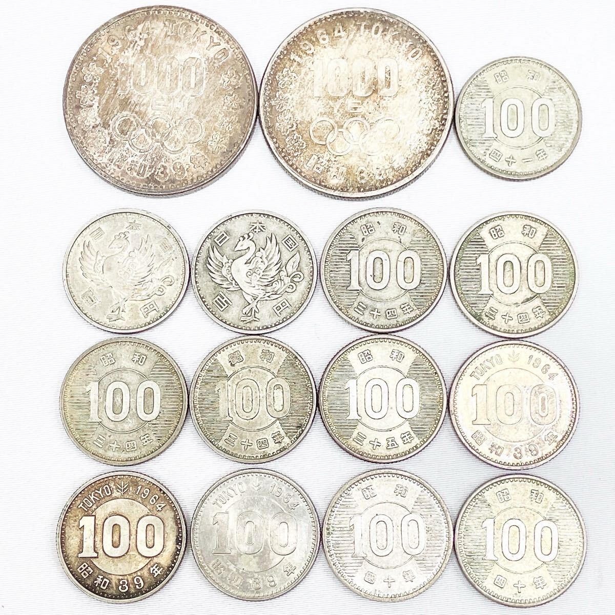 1，000円銀貨1枚・100円銀貨15枚（稲穂10枚・東京五輪
