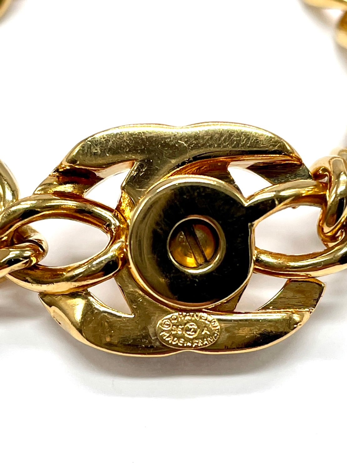 CHANEL / ターンロックラインストーンブローチ/ラインストーン/GLD