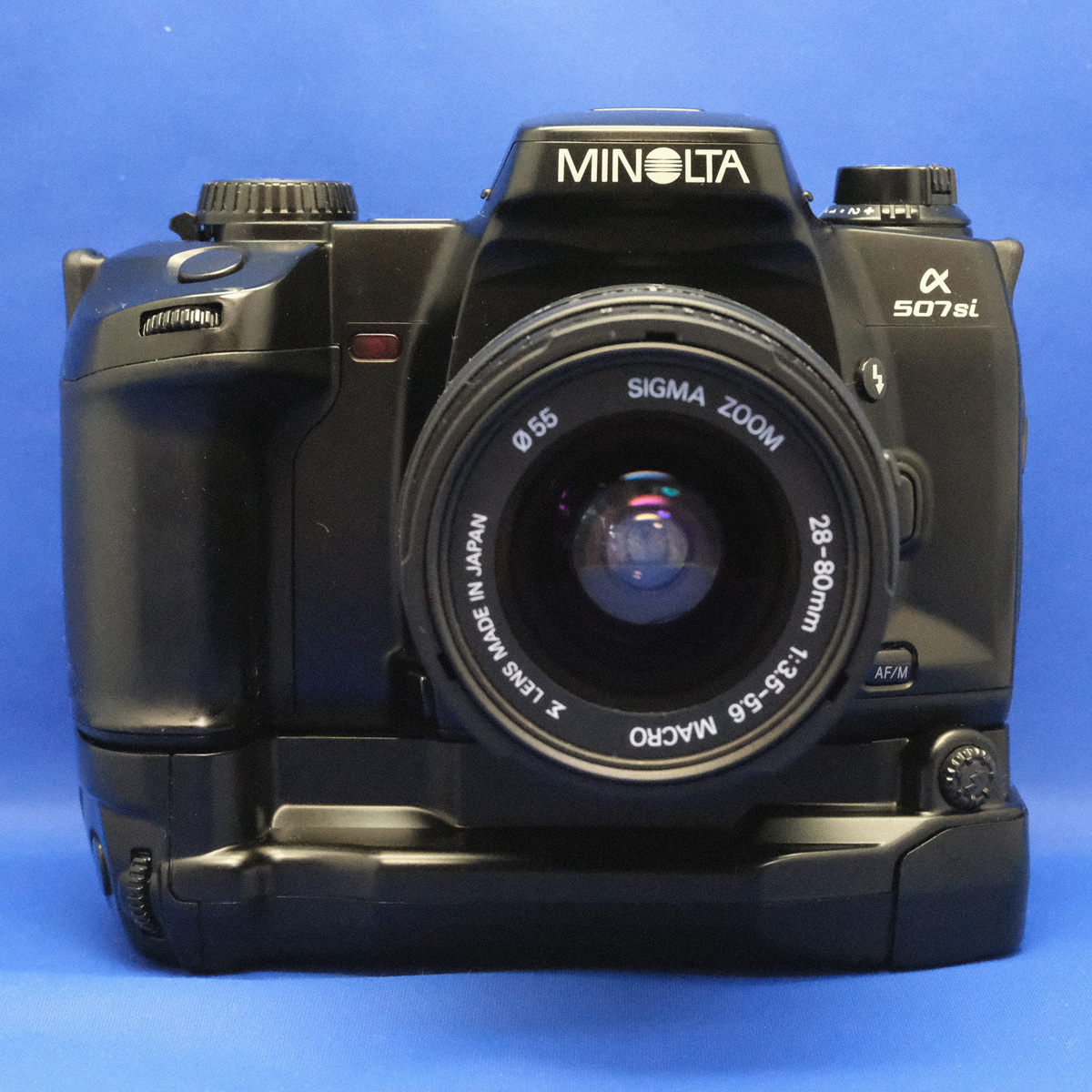 MINOLTA α507si フィルムカメラ + AF 28-300mm レンズ 縦グリ付きの
