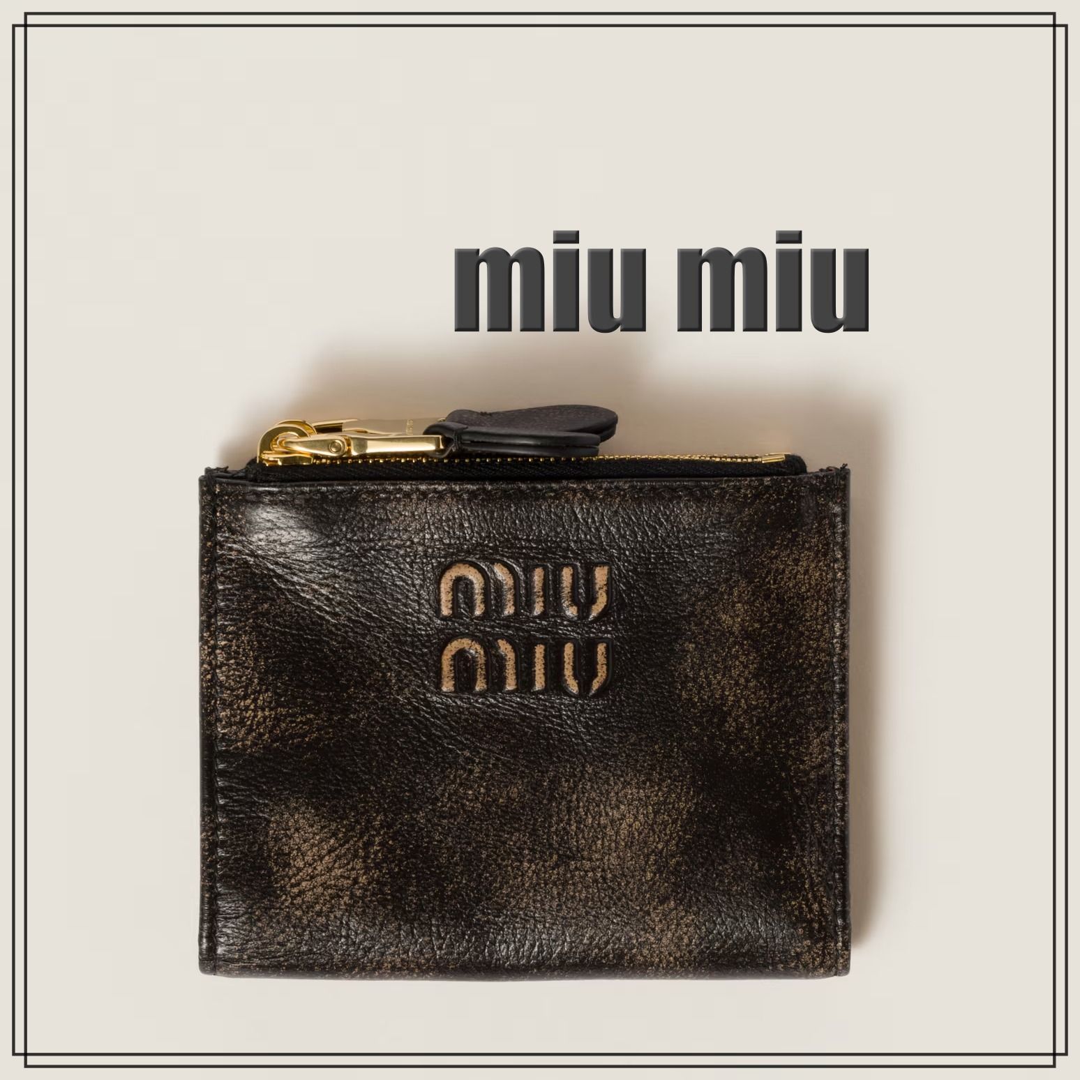 MIU MIU ブラック 二つ折り財布ナッパレザー
