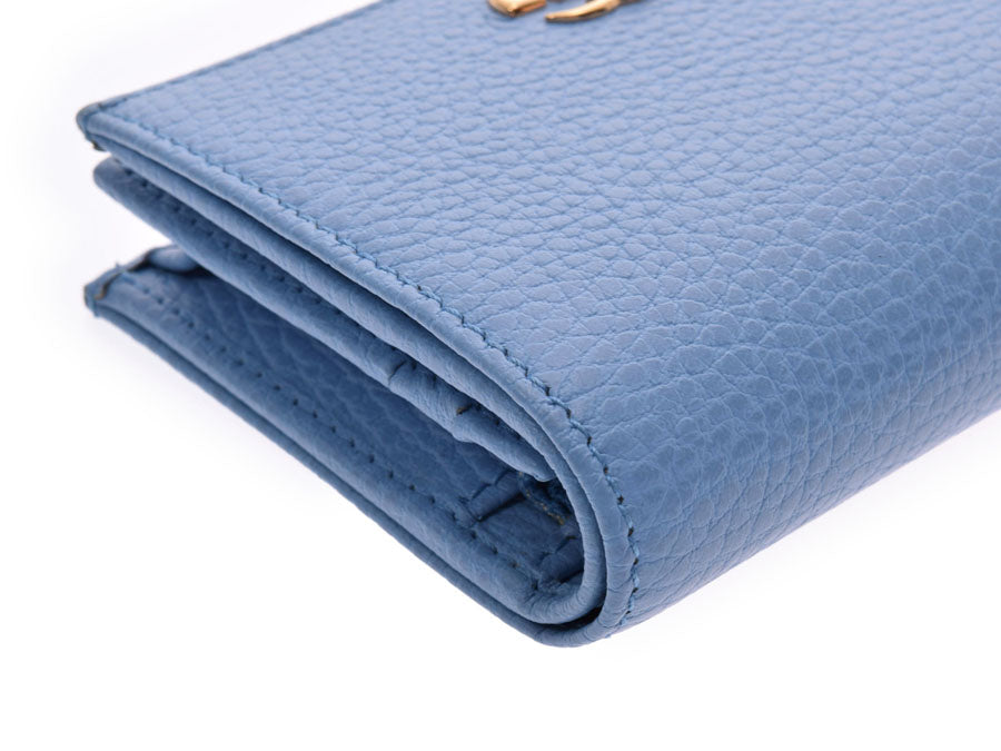 グッチ プチマーモント コンパクト二ツ折財布 水色 GP金具 456126