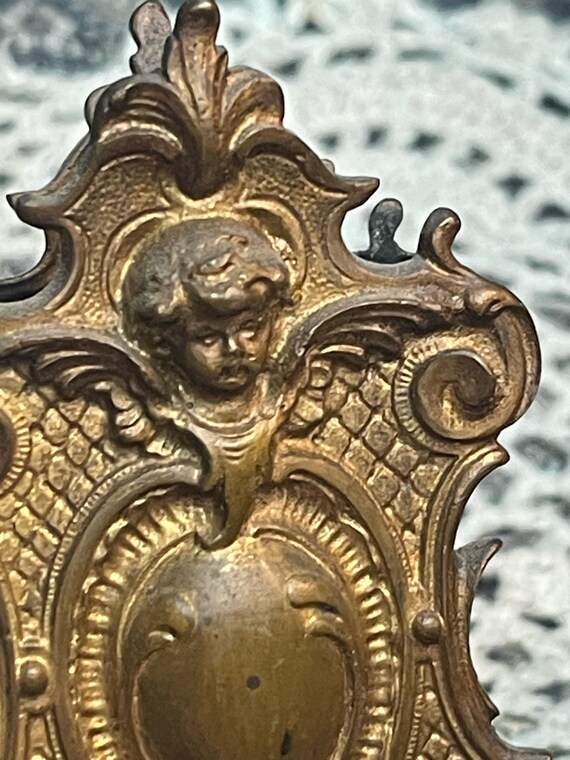 Antique Ornate Brass or Gilded Metal Cherub Matchbox Holder
