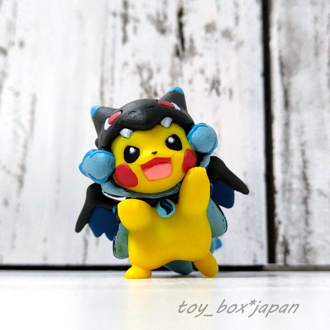 Pokemon Center Figure Pikachu wearing a Mega Charizard X Poncho
