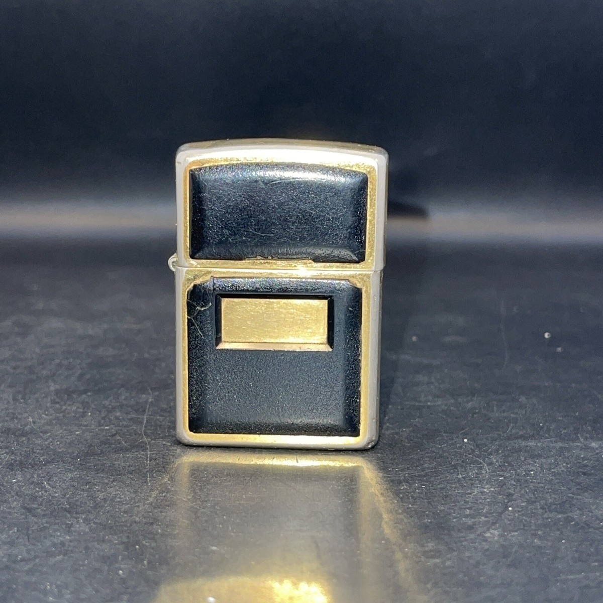 VTG 1994 D X Zippo Gold Brass Black Plastic - UNENGRAVED HAS WEAR