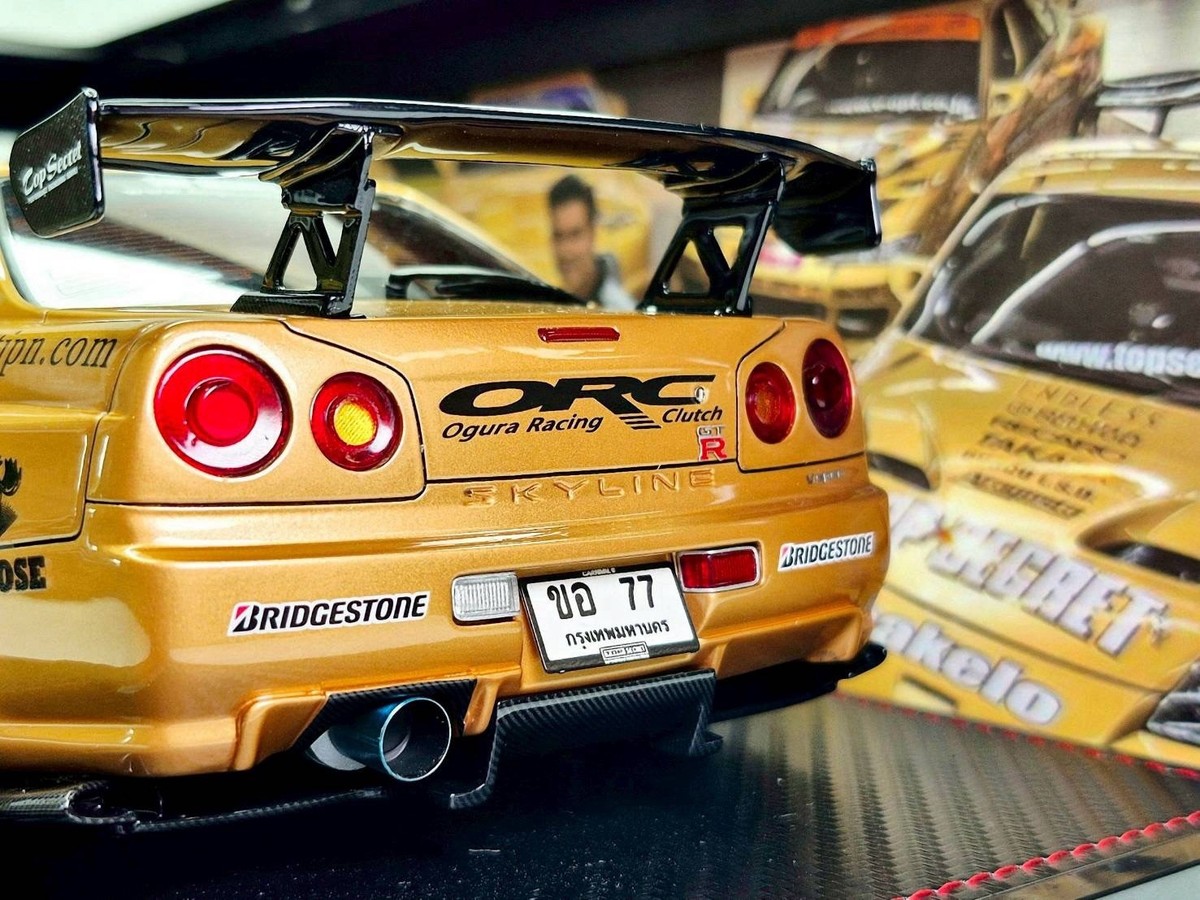 IG3799 – 1/18 TOP SECRET 34GT-R (BNR34) Gold Comes with RB26