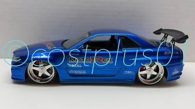 JADA DUB CITY 2002 NISSAN SKYLINE GT R R34 1:24 BLUE MOTOREX ## | eBay