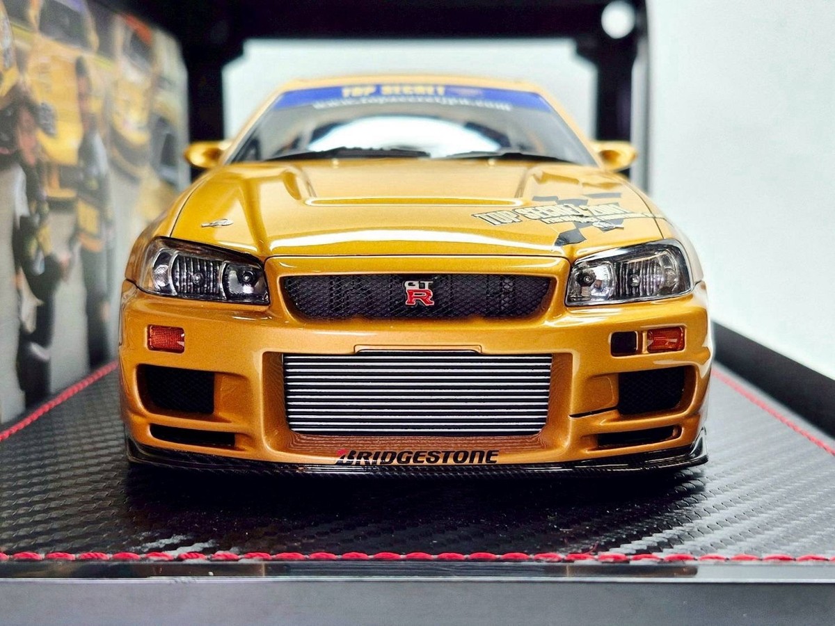 IG3799 – 1/18 TOP SECRET 34GT-R (BNR34) Gold Comes with RB26