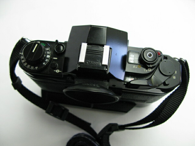 Canon A-1 film camera body with Genuine strap and Power Winder A2