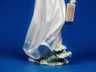 Lladro Porcelain Figurine # 7604 School Days” Girl with Flowers.by