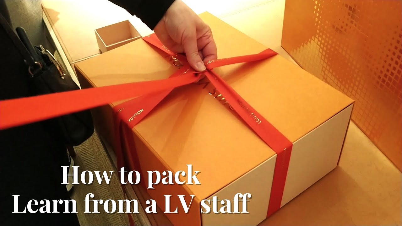 How to decorate the box with a ribbon at #LouisVuitton