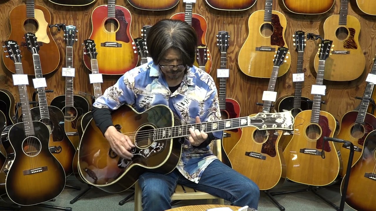 GIBSON J 200 DELUXE ROSEWOOD 1995 - YouTube