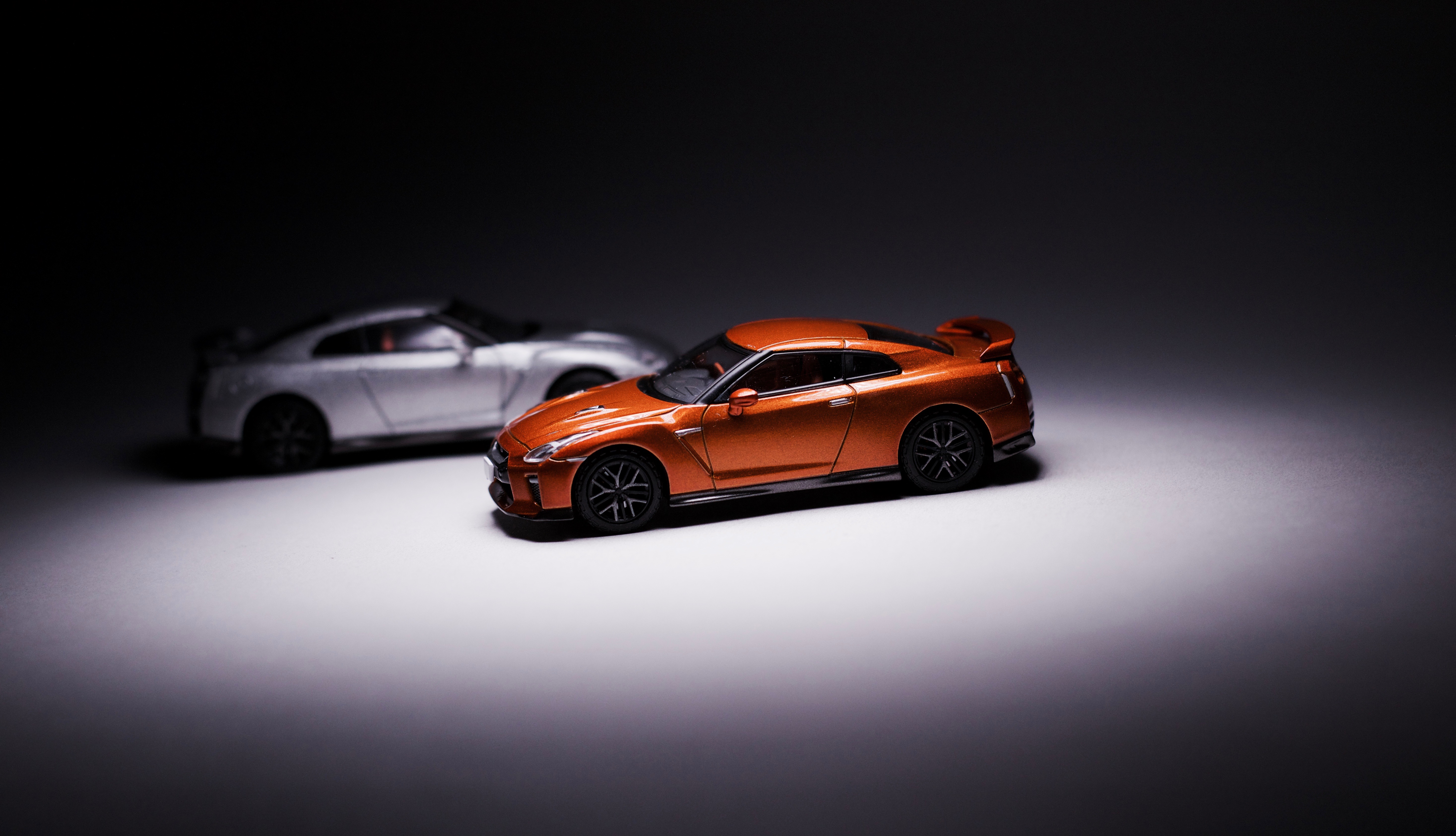 The brilliant orange of the Tomica Limited Vintage 2017 Nissan GT