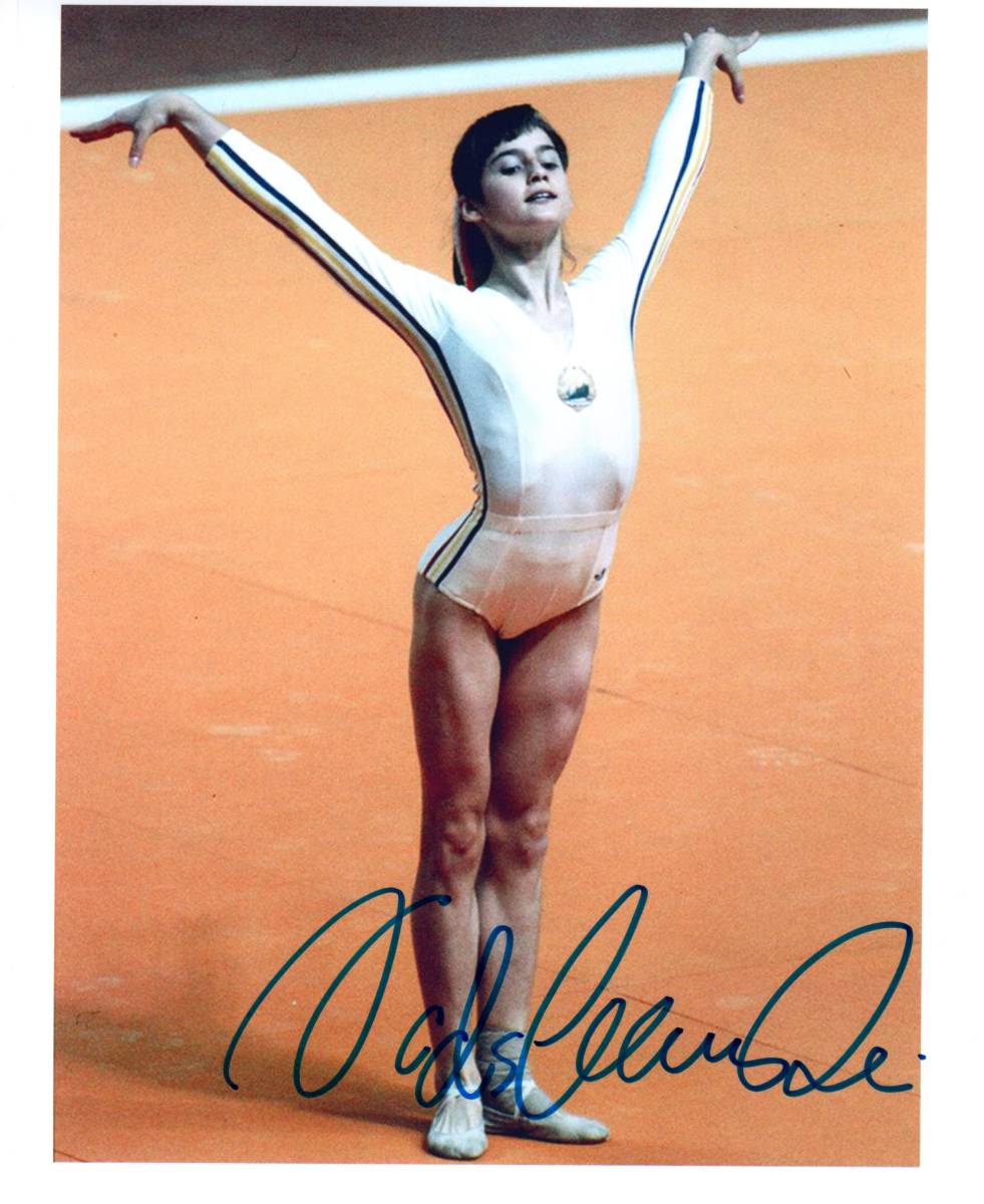 体操選手 ナディア・コマネチ 直筆サイン入り写真 金メダリスト 白い