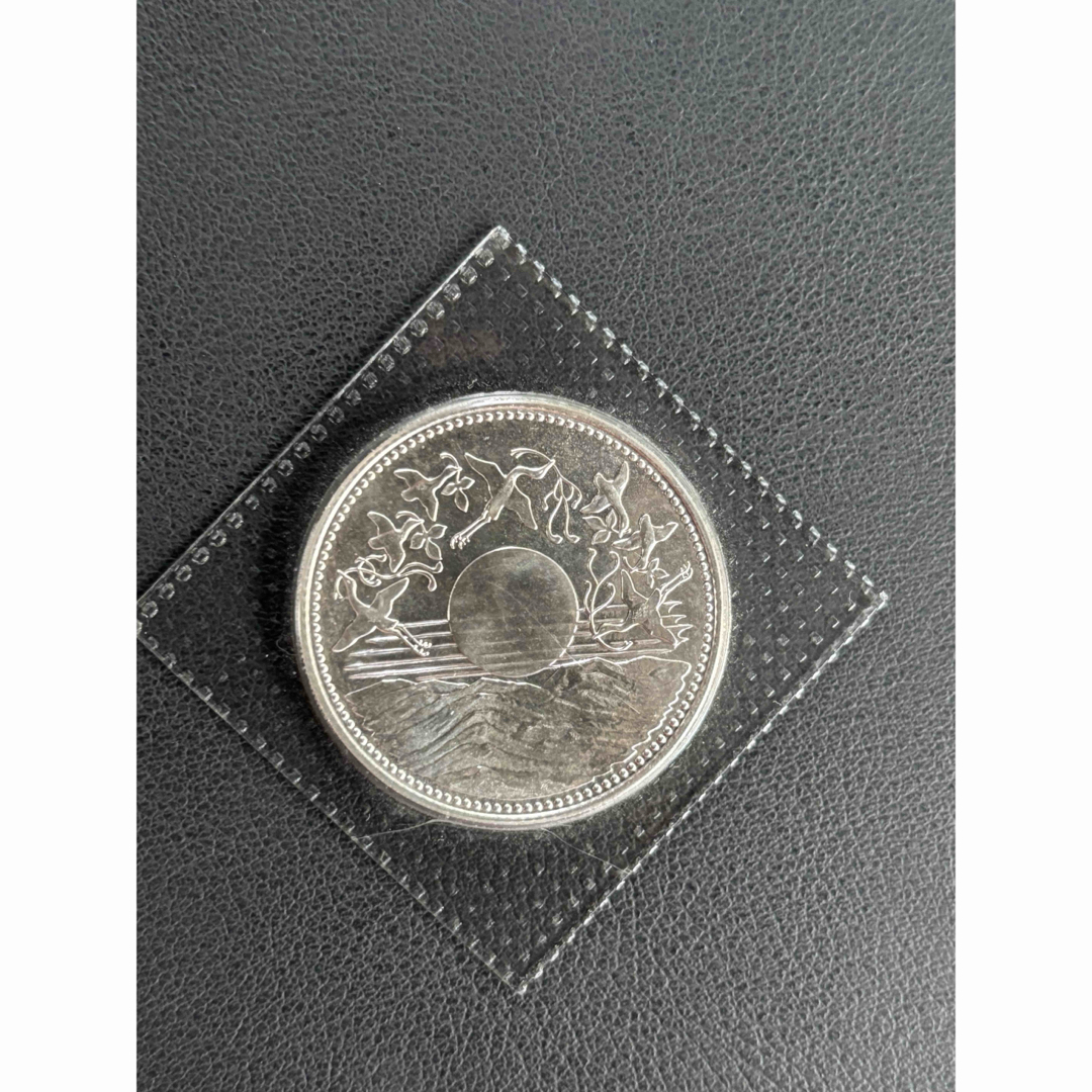 天皇陛下御在位六十年記念硬貨」の銀貨 昭和 一万円