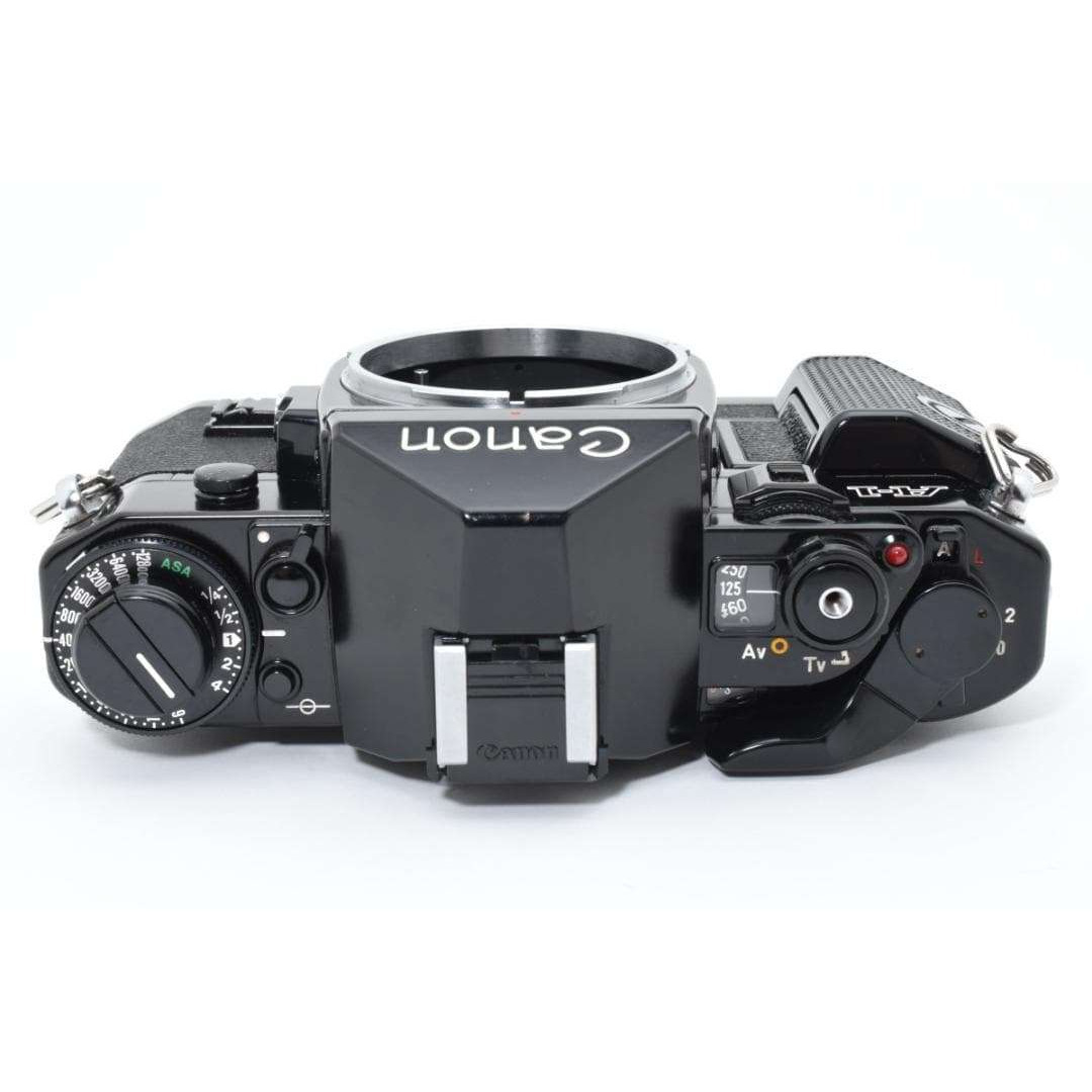 超美品 CANON キャノン A-1 フィルムカメラ モルト新品交換済 M607