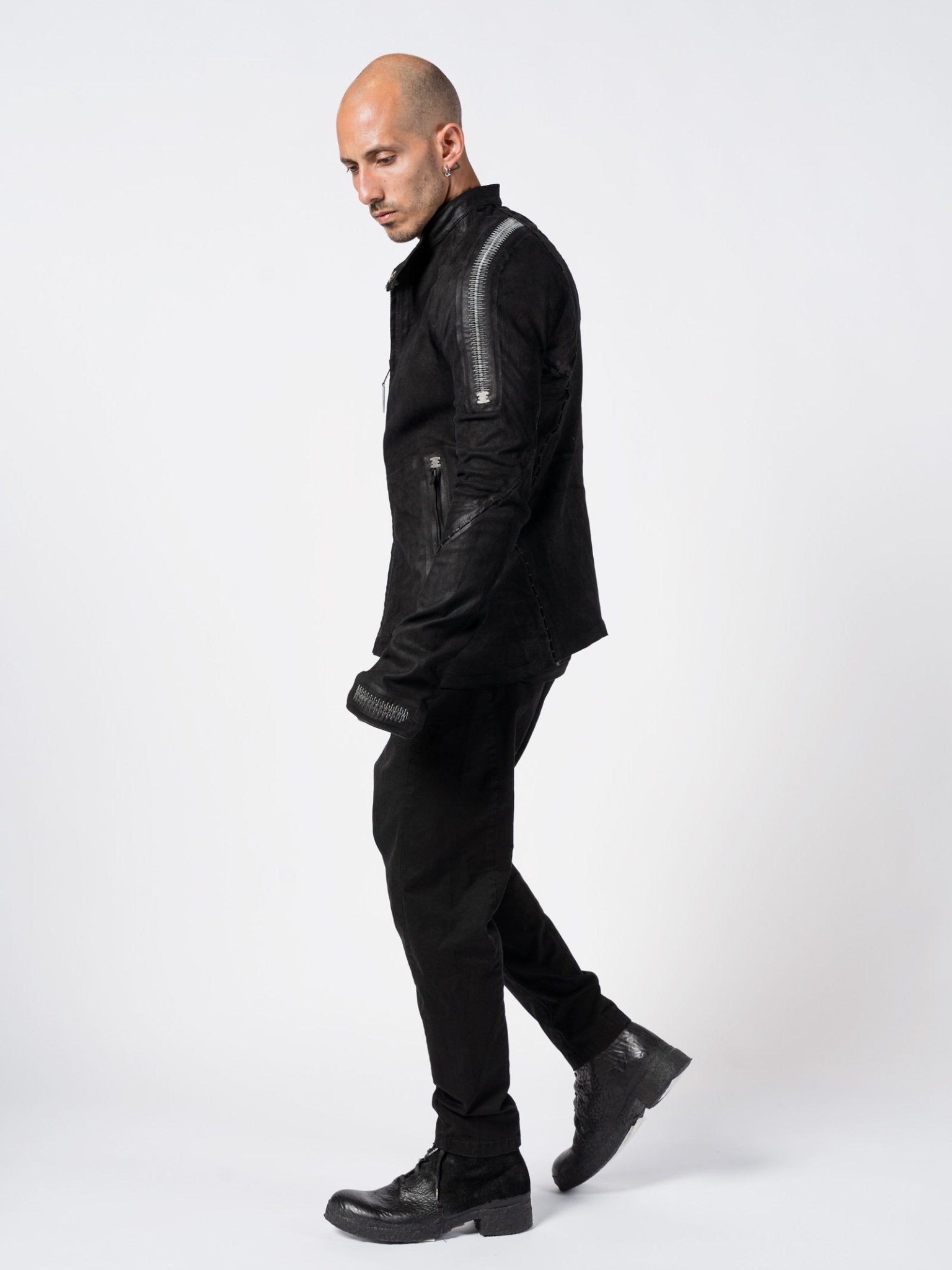 Stapled Leather Jacket with Anatomical Paneling by ISAAC SELLAM