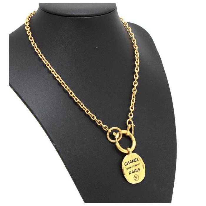 CHANEL ヴィンテージ 三角プレート ゴールド ブラック ブローチ 【公式