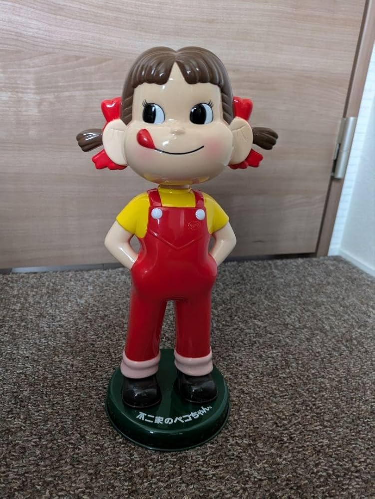 ザ・逸品堂】商品一覧 / 「ペコちゃん」ミニ首ふりペコちゃん