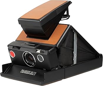 Polaroid Sx-70 Black Model 2 with Strap and Vintage Polaroid Ever