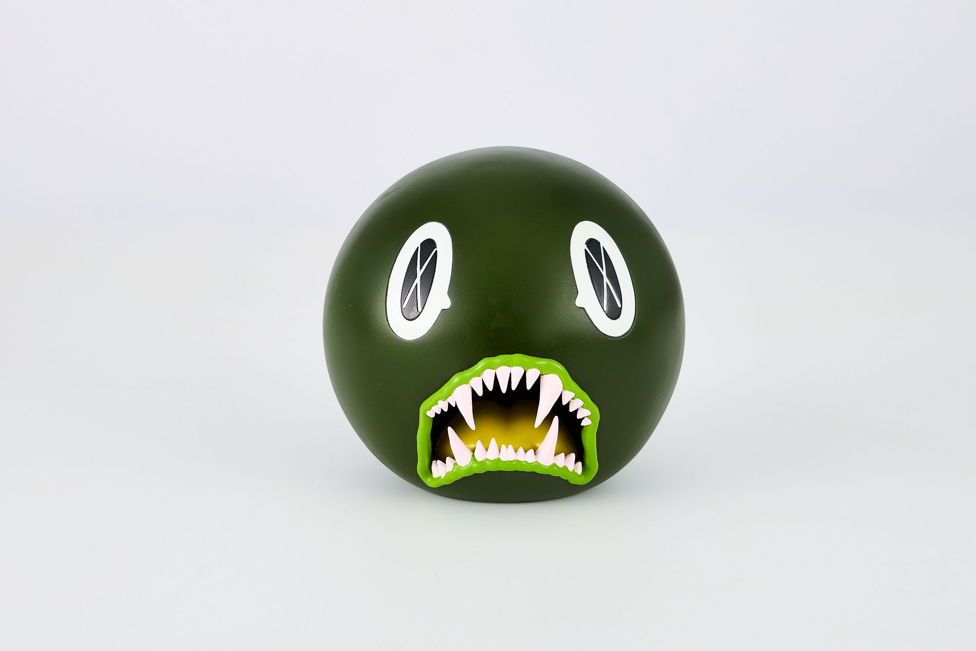 KAWS (Brian Donnelly), 'Cat Teeth Bank (Green)' sold at auction on