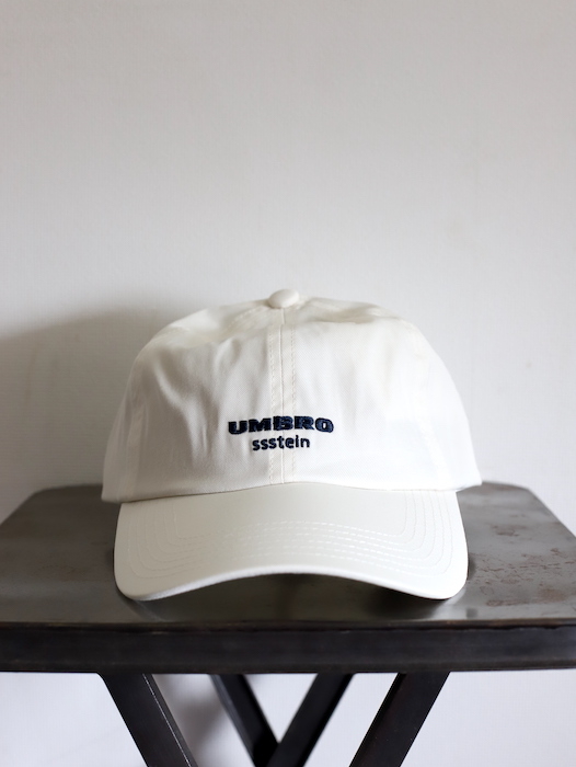 ssstein × UMBRO ] WATER REPELLENT CAP IVORY - spares