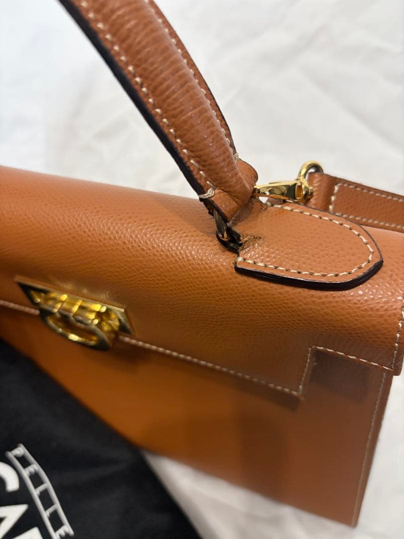 カルボッティブラウンレザー ショルダーバッグ