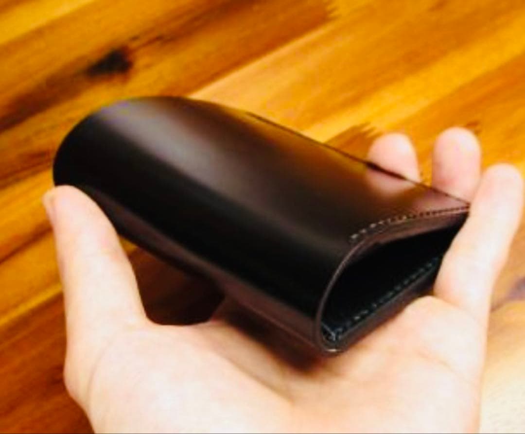 か*ん様 世界に１つ❗️新喜皮革 コードバン ブラック 黒 手縫い 二つ折り 栃