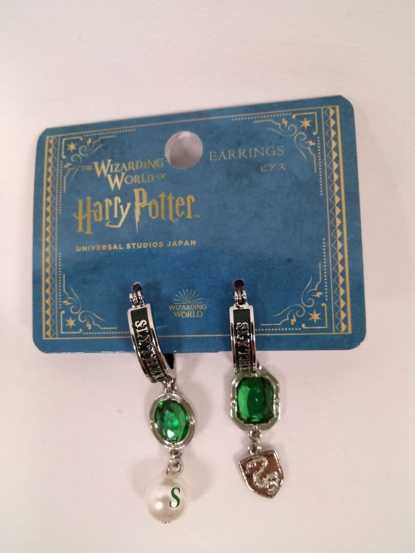 USJ ハリーポッター スリザリン ピアス - メルカリ