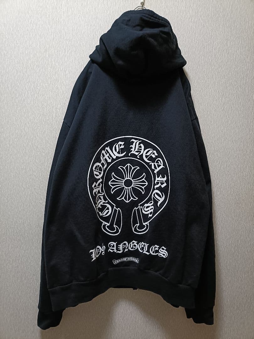 CHROME HEARTSバックホースシュープリントダガージップアップパーカー