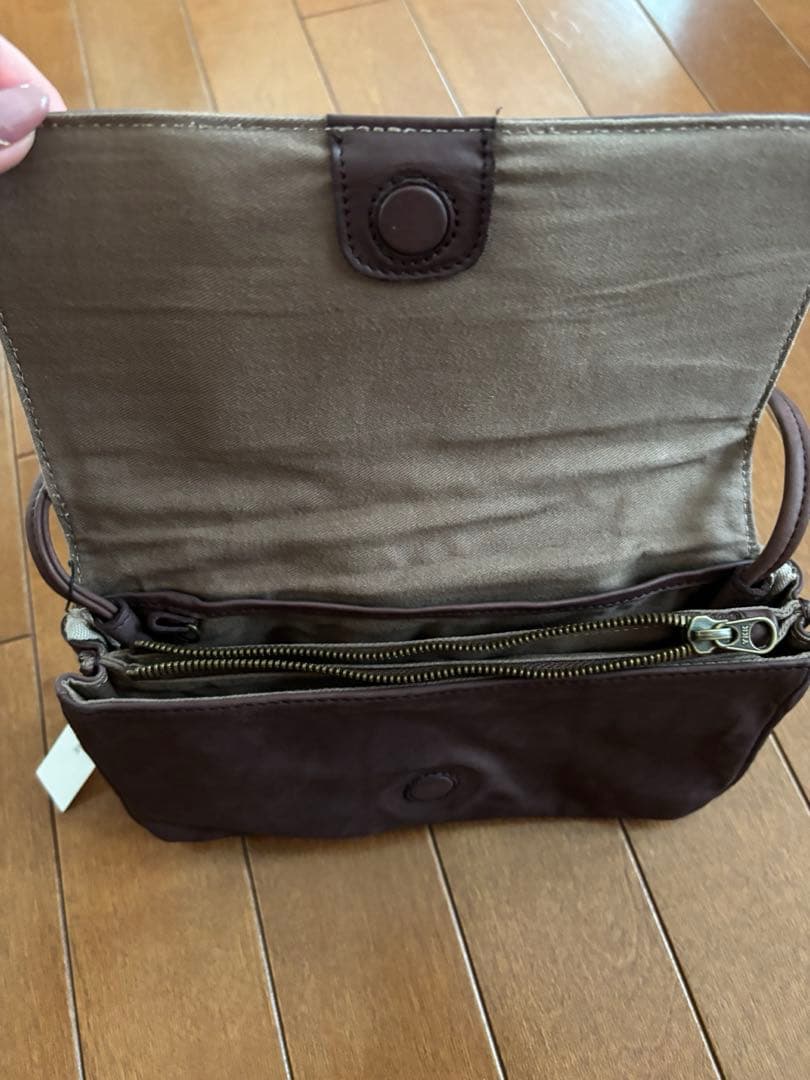 パドカレ　ハンドムラ染めレザーポーチバッグ