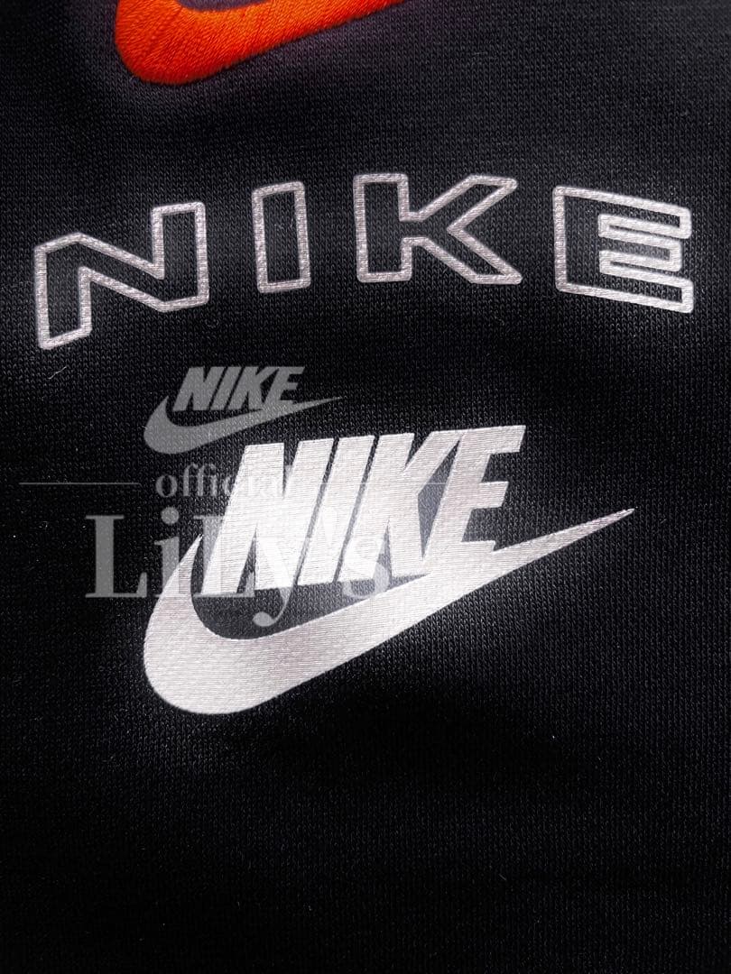 【Ｍサイズ】新品未使用　ナイキ上下セットアップ　ブラック✖︎オレンジ　黒　ロゴ刺繍