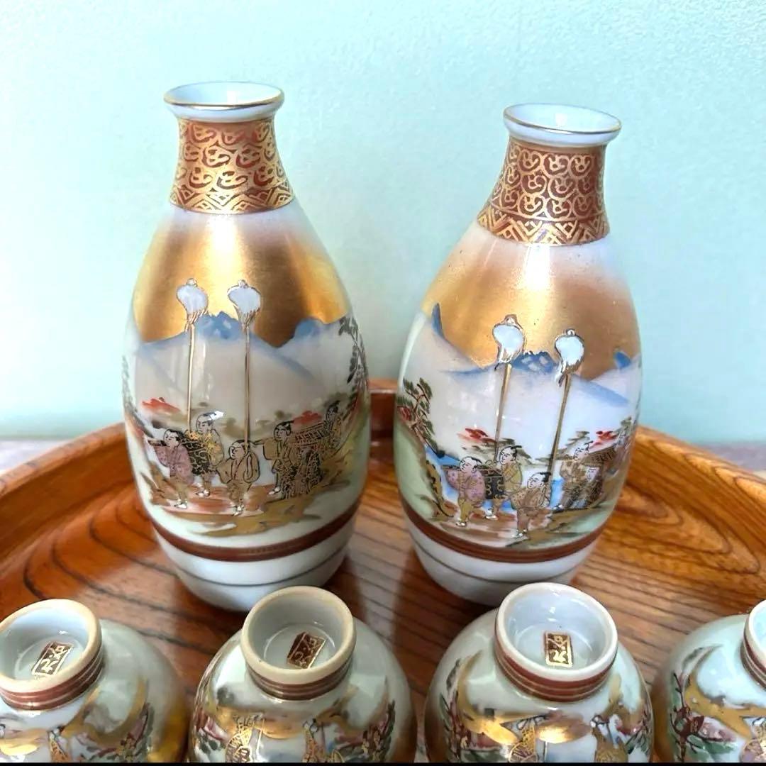 新品】九谷焼 大名行列 酒器 豪華金彩 徳利2本 盃10個 九谷色絵 金