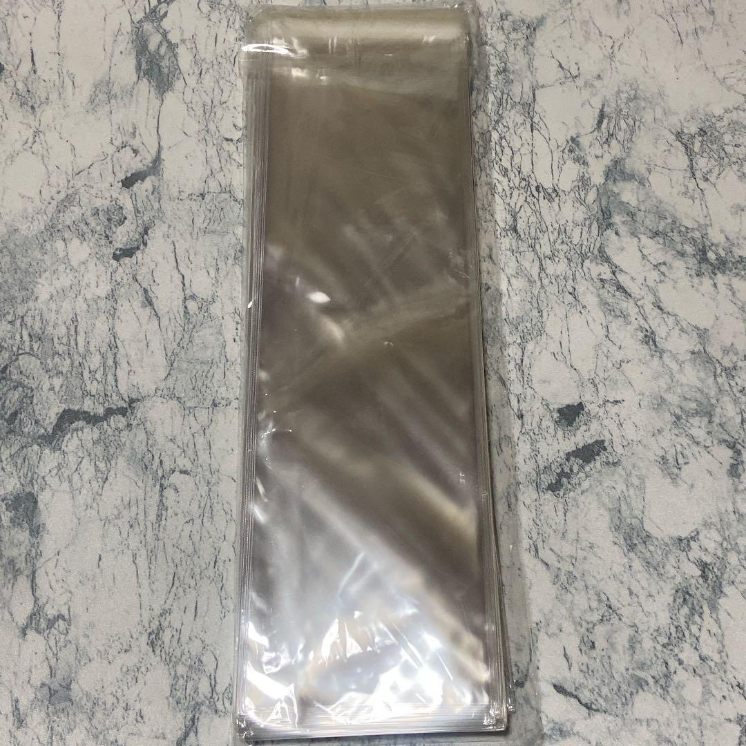 OPP袋 透明80×250サイズ　フタ付 シール付 100枚入 OPP袋 透明【80×250サイズ】 フタ付 シール付 【100枚入】 - メルカリ